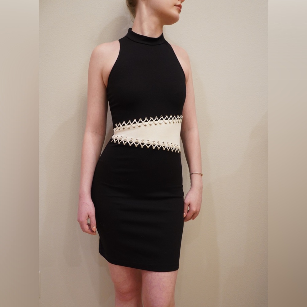 Elegant Black Dress with Cream Asymmetrical Stitched Accents